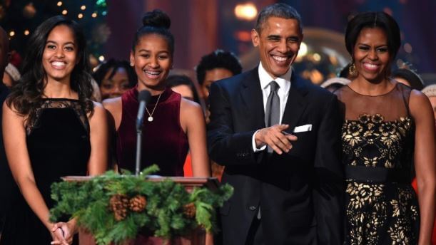 Malia with her parents and sister